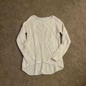 Delia’s white sweater
